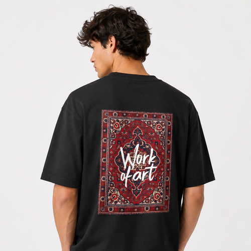 A man wearing a black t-shirt from the back, featuring a large graphic print of a red and beige patterned oriental rug with the words 'Work of art' written in white script.