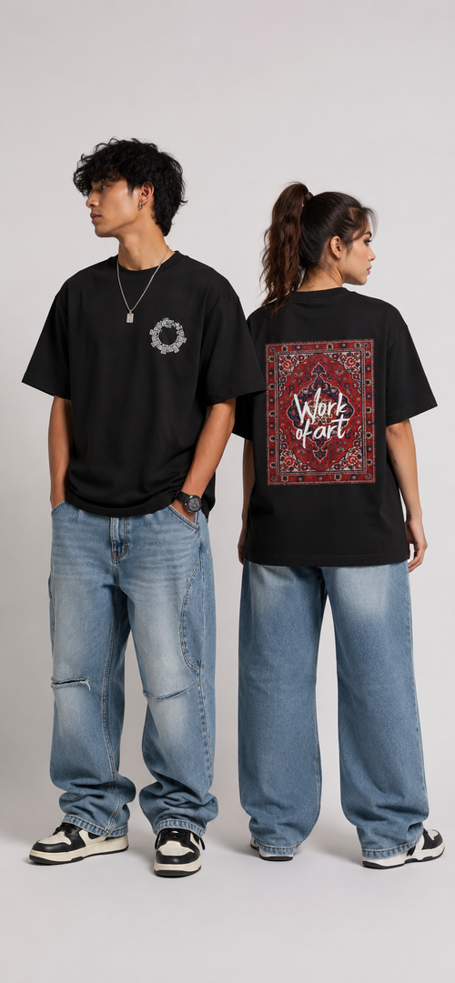 Two models wearing black graphic t-shirts and wide-leg blue jeans, shown from the front and back against a light gray studio background. The front model has a small white circular graphic on the chest, and the back model shows a large red and black patterned graphic with white text reading 'Work Hard'.